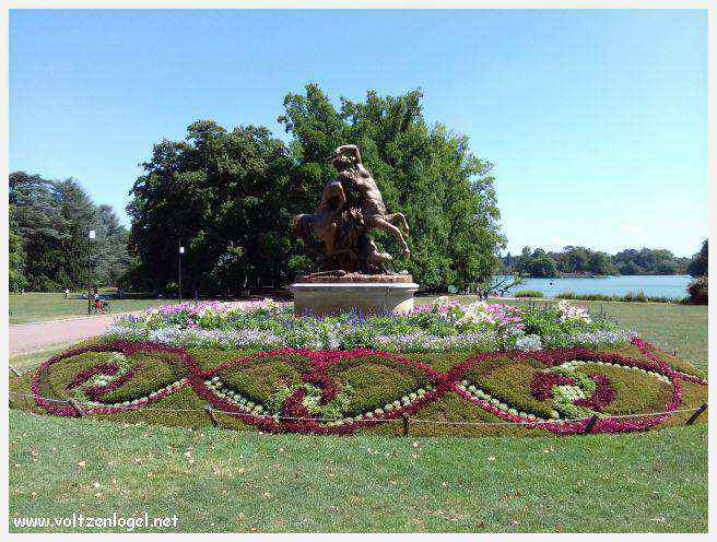 Parc de la Tête d'Or: Oasis urbaine de Lyon, mélange de nature et d'histoire.