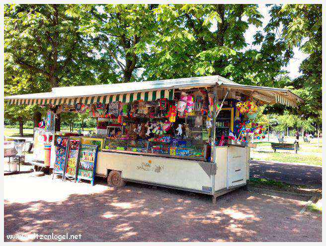 Parc de la Tête d'Or: Oasis urbaine de Lyon, mélange de nature et d'histoire.